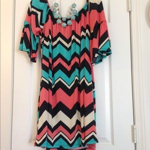 Joel Chevron tunic mini dress with bell sleeves